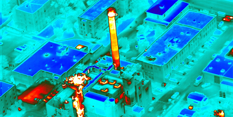 Aerial infrared image of an industrial building complex energy efficiency survey