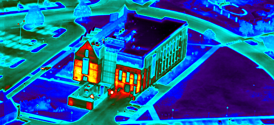 Aerial infrared survey of an institutional building showing energy efficiency